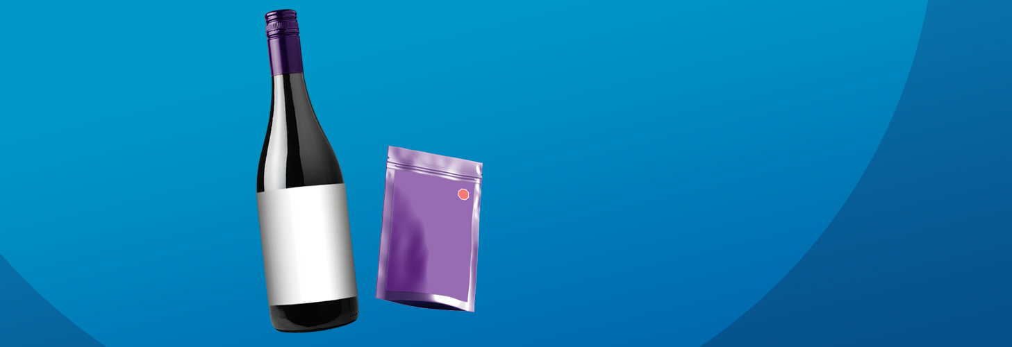 Two tone blue background with a wine bottle and purple cannabis pouch. 