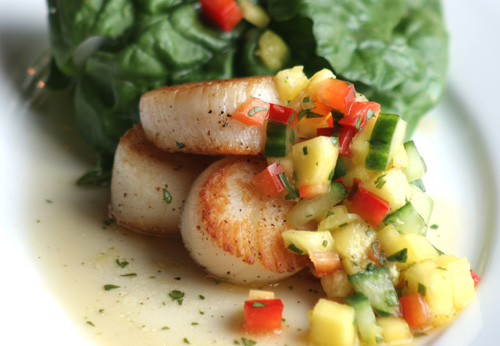 Pan seared scallops with chipotle lime cream and fresh tropical salsa