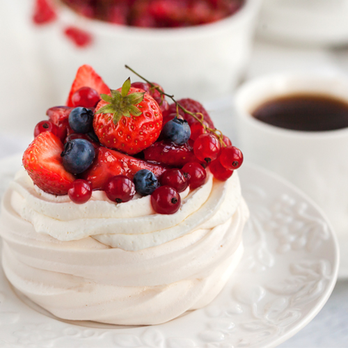 Whipped pavlova with assorted berries on top