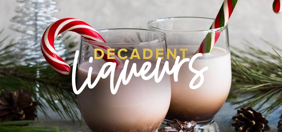 Two glasses filled with opaque liquid, garnished with candy canes and headline that reads 