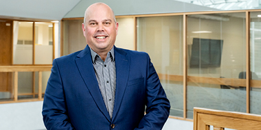 Photo of Greg Hughes at the NSLC head office