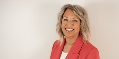 Image of Susan MacDougall in a pink blazer