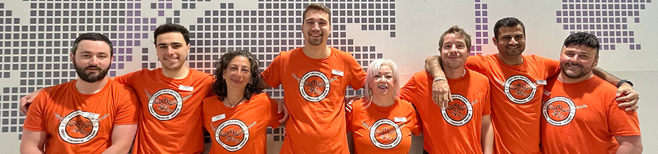 NSLC team members wearing their orange shirts for Orange Shirt Day