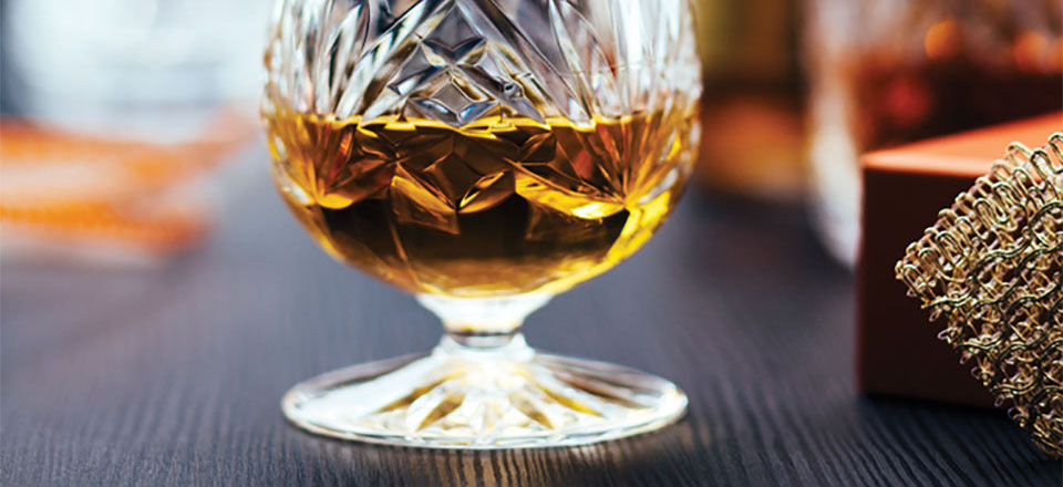 Single malt whisky in a decorative glass.