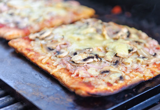 Flatbread pizza on a barbeque grill