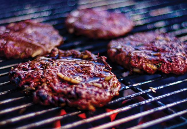 Burgers on a barbecue grill