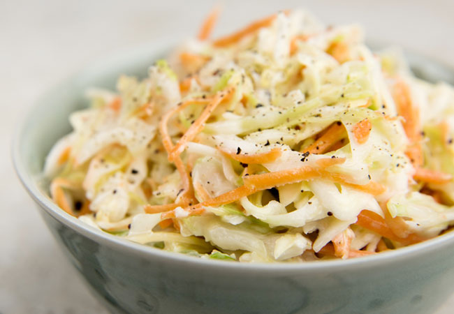 Bowl of traditional cabbage coleslaw, peppered