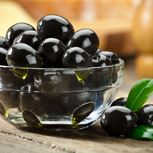 A small bowl of garlic marinated olives