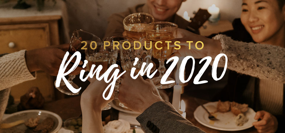 Five people toasting goblet glasses over a table with mostly empty plates. Text that says “20 Products to Ring in 2020”.