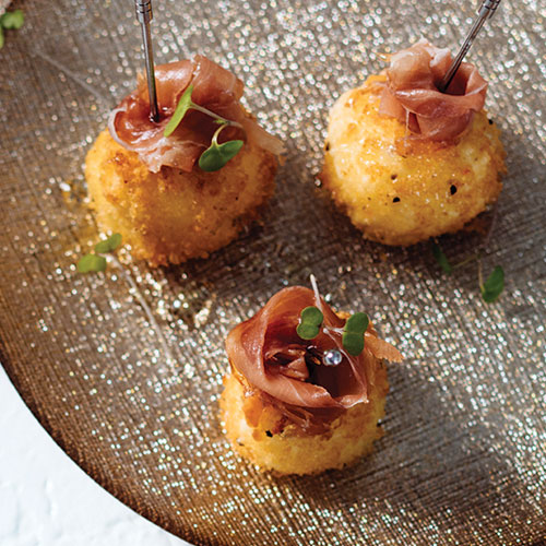 3 fried goat cheese balls topped with proscuitto 