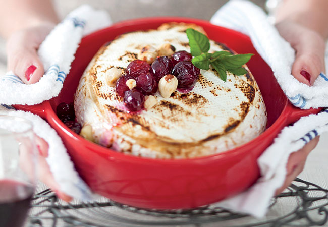 Baked brie in a red dish