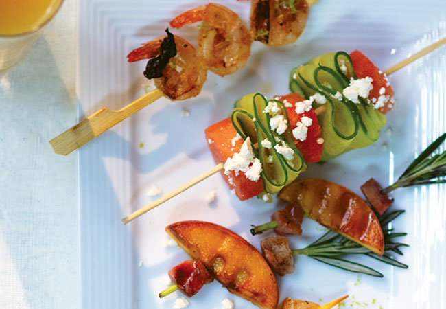 Watermelon and cucumber skewered topped with feta