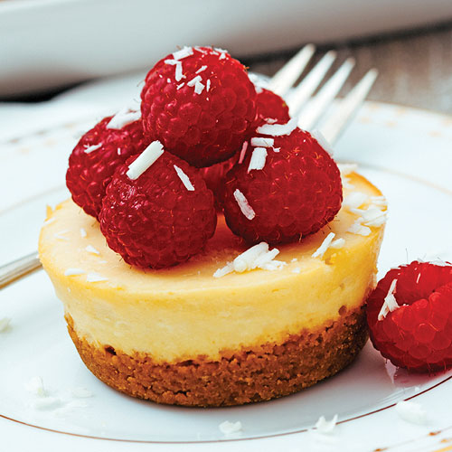 Mini cheesecake topped with raspberries
