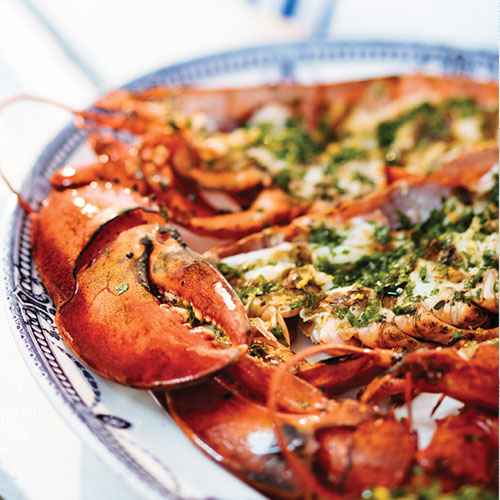 Cooked lobster with herbed butter