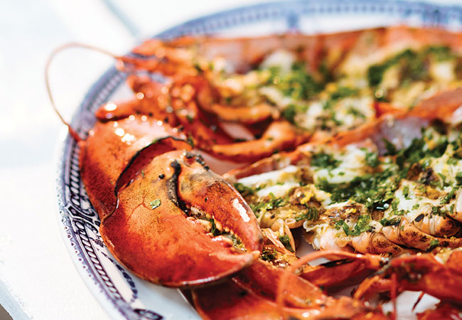 Cooked lobster with herbed butter