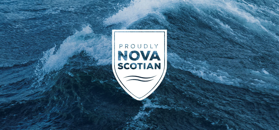 A white-capped ocean wave overlaid with the 'Proudly Nova Scotian' badge.