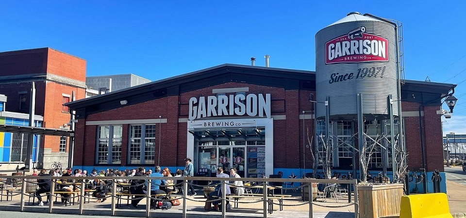 Outside of Garrison Brewery on the Halifax Waterfront. Brick building with large Garrison sign above main doors.