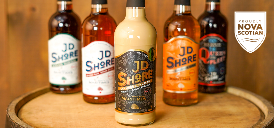 Jd Shore products in a triangle shape placed on top of a barrel
