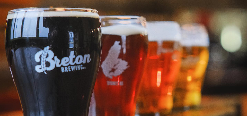 Line up of Breton Brewing Beers. Starting with the darkest beer closest to in the image then progressing to the lightest beer.