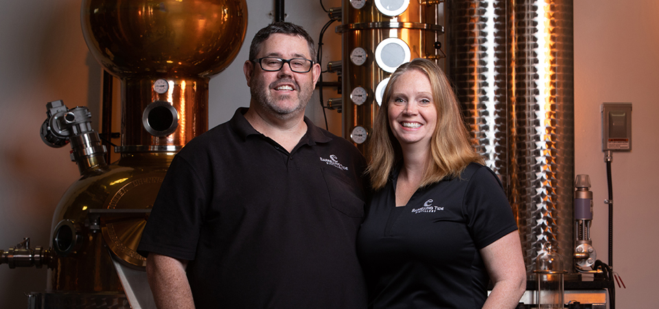 Two owners of Barrelling Tide Distillery.