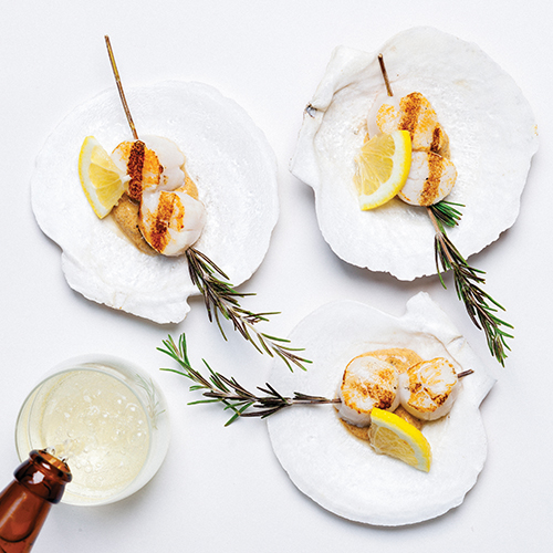 Grilled Scallops with Curry Yogurt, ganrished with rosemary and lemon